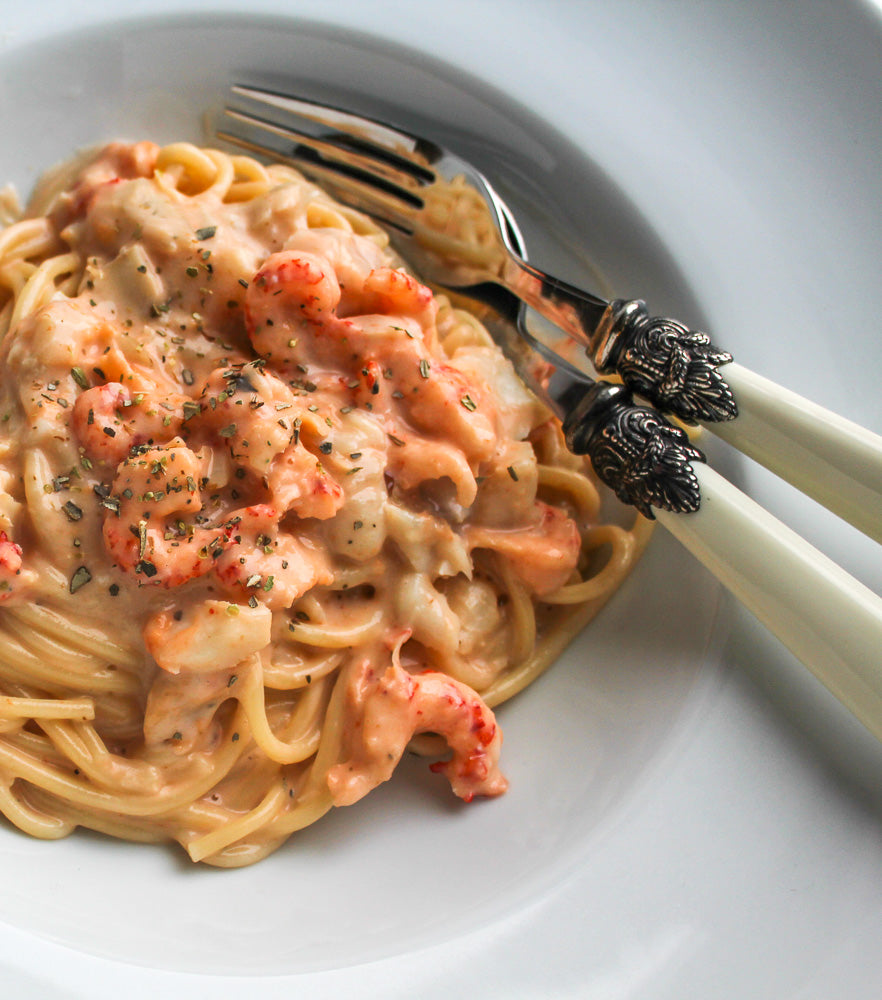Pasta met langoustinesaus, rivierkreeftjes en champignons