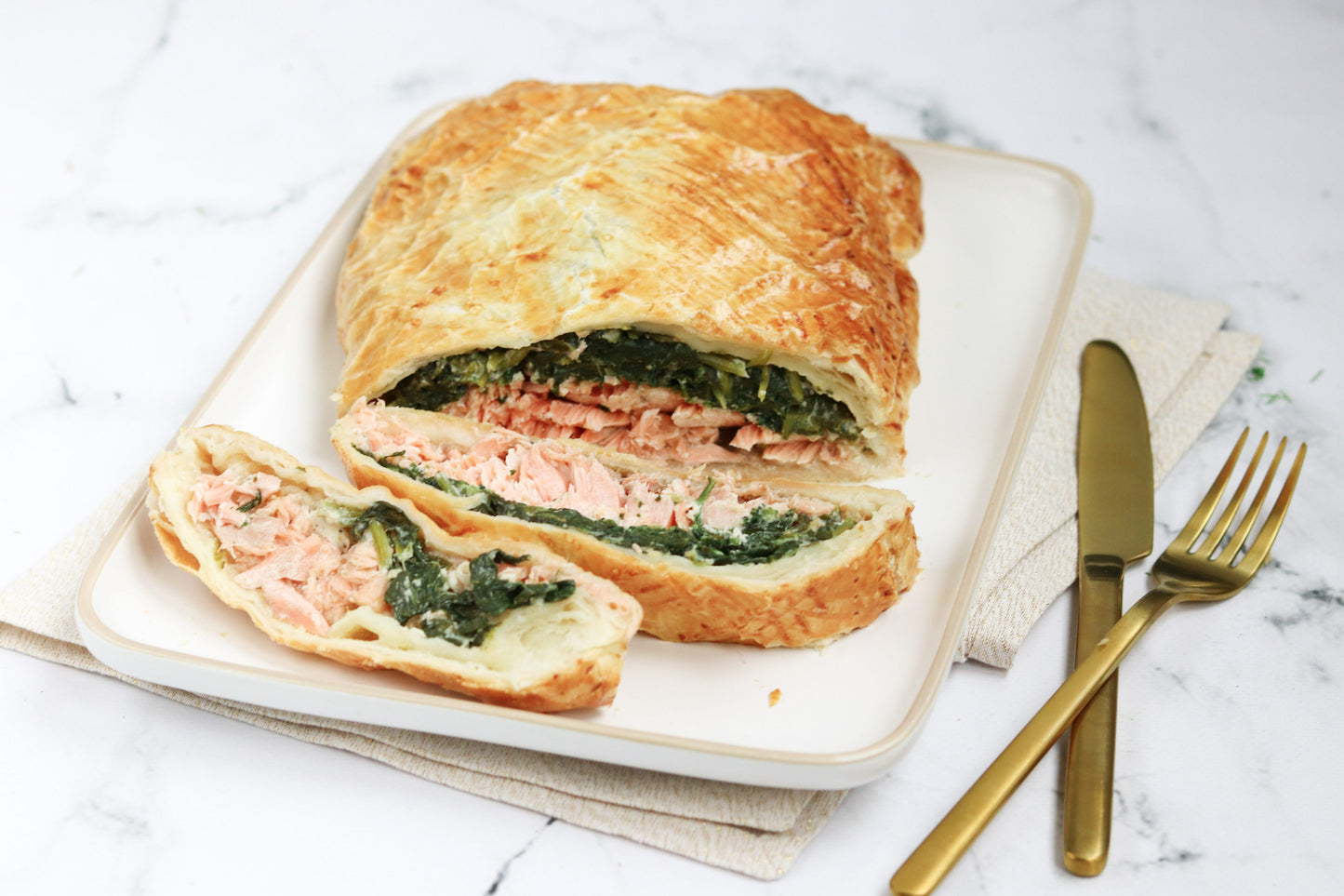 Zalm en croûte; met spinazie, roomkaas, mierikswortel en kruiden