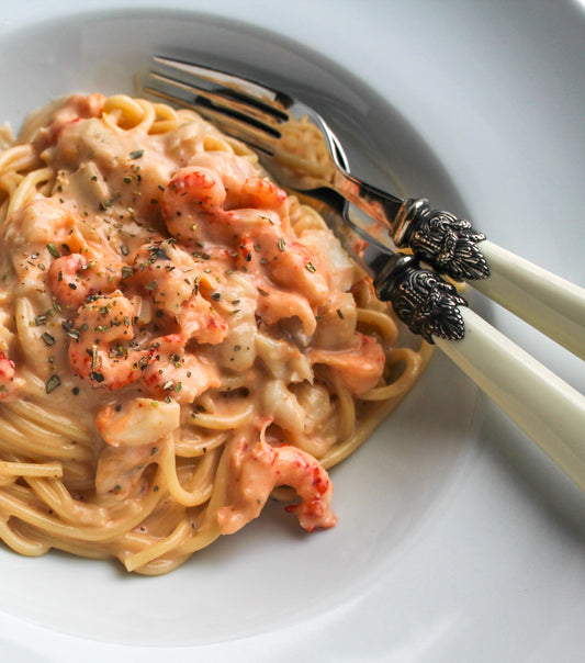 Pasta met langoustinesaus, rivierkreeftjes en champignons