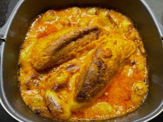 Quenelles (gepocheerde vis mousse) van snoekbaars met rivierkreeftensaus