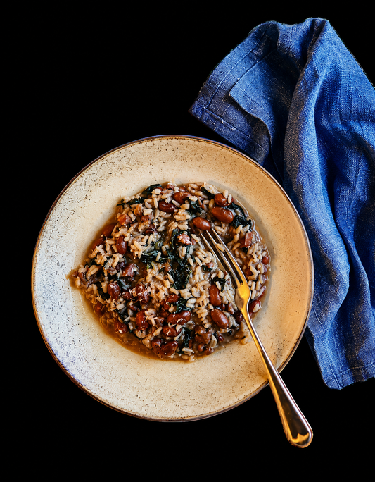 Paniscia, Italiaanse risotto achtige maaltijd met Italiaanse worst, rijst, bonen, panchetta en cavolo.