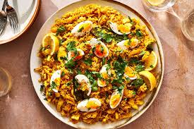 Kedgeree; heerlijk Schots gerecht van gerookte en gekookte vis, rijst en ei.